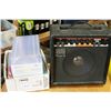 Image 1 : ROLAND GUITAR AMP AND LOT OF GUITAR MAGAZINES AND CD CASES
