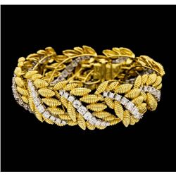 18K Yellow and White Gold 9.60ctw Diamond Floral Bracelet