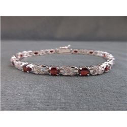 BRACELET - 6CTW (12)OVAL FACETED GARNET & DIAMOND IN STERLING SILVER INFINITY DESIGNED SETTING - RET