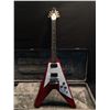 Image 1 : GIBSON FLYING V, IN HERITAGE CHERRY FINISH WITH WHITE PICK GUARD, WITH DUAL HUMBUCKER PICKUPS, MADE