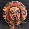 Image 1 : HAND CARVED AND PAINTED "WILDMAN OF THE WOODS" MASK ON ROUND PANEL, BY HUBERT BILLY, 23'' W