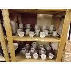 TEA CUPS AND SAUCERS - 2 SHELVES