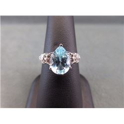 RING - 3.5CT PEAR FACETED LIVELY SKY BLUE TOPAZ & 2 DIAMONDS IN STERLING SILVER SETTING - ESTIMATED 