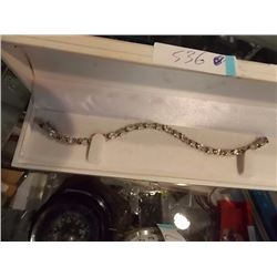 BRACELET - 6.84 CTW (12) OVAL FACETED WHITE TOPAZ & ROUND FACETED DIAMOND IN STERLING SILVER INFINIT