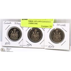 LOT OF THREE 1973-1975 CANADIAN 50 CENT COINS UNC