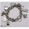 Image 1 : ESTATE .925 CHARM BRACELET WITH .925 CHARMS (15QTY