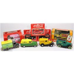 BOX WITH 4 COIN BANKS TRUCKS INCL 4 COCA COLA