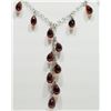 Image 1 : #26-10K WHITE GOLD GARNET (11.3CT) FREE FLOWING