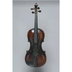 A VIENNES VIOLIN, bearing a Thir label, the one piece back of plain wood, the sides and scroll si...