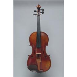 A FRENCH VIOLIN BY PAUL JOMBAR, bearing the maker's label, the two piece back of broad horizontal...