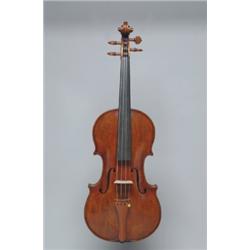 A GERMAN VIOLIN, bearing a Matthias Hornsteiner label dating the instrument to 1878, the two piec...