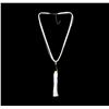 Image 1 : Silk Tassel Leather Necklace - Gold Plated