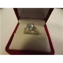 RING - 3.5CT PEAR FACETED LIVELY SKY BLUE TOPAZ & 2 DIAMONDS IN STERLING SILVER SETTING - ESTIMATED 