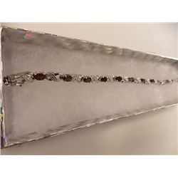 BRACELET - 6.0 CTW (12) OVAL FACETED GARNET & DIAMOND IN STERLING SILVER FIGURE 8 DESIGNED SETTING -