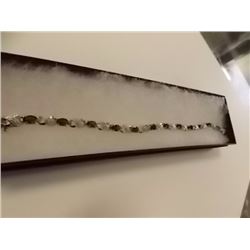 BRACELET - 6CTW (12)OVAL FACETED GARNET & DIAMOND IN STERLING SILVER INFINITY DESIGNED SETTING - RET