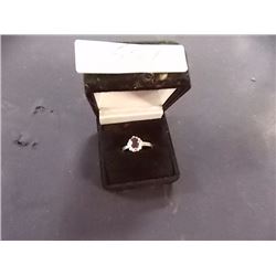 SILVER RING - STAMPED 925 - PURPLE STONE