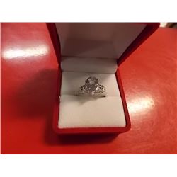 RING - 3.5CT PEAR FACETED LIVELY SKY BLUE TOPAZ & 2 DIAMONDS IN STERLING SILVER SETTING - ESTIMATED 