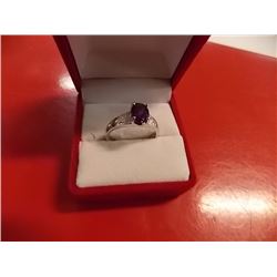 RING - OVAL FACETED 1.5CT AMETHYST & 2 DIAMOND RING IN STERLING SILVER SETTING - RETAIL ESTIMATE $35