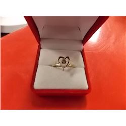 RING - CENTER RUBY IN 10K YELLOW GOLD SETTING - HEART DESIGN - RETAIL ESTIMATE $350