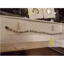 BRACELET - 12  OVAL FACETTED WHITE TOPAZ & DIAMONDS IN STERLING SILVER INFINITY LINK SETTING - ESTIM