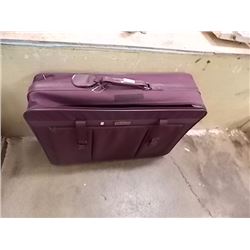 PURPLE SUIT CASE