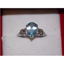 RING - 3.5CT PEAR FACETED LIVELY SKY BLUE TOPAZ & 2 DIAMONDS IN STERLING SILVER SETTING - ESTIMATED 