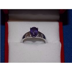 RING - 2CT OVAL FACETED AMETHYST & 2 DIAMONDS IN STERLING SILVER SETTTING - RETAIL ESTIMATE $400