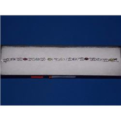 BRACELET - 4.5CTW OVAL FACETED MULTI GEMSTONES AND ROUND FACETED DIAMOND IN STERLING SILVER SETTING 