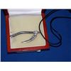 Image 1 : NECKLACE - SILVER SYTHE - ~2 ½" TALL - ON ROPE