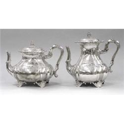 CONTINENTAL SILVER TEA POT AND COFFEE POT, Italian. 20th Century. (.800 Fine) Each fluted vesse...