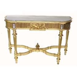 LOUIS XVI STYLE CARVED AND GILTWOOD CONSOLE TABLE, 19th Century. The shaped marble top above th...