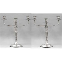 PAIR OF EMPIRE STYLE STERLING SILVER THREE LIGHT CANDELABRA, South American. Each circular base...