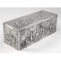 CONTINENTAL SILVER BOX, European. 19th Century. The rectangular hinged cover embossed with vill...