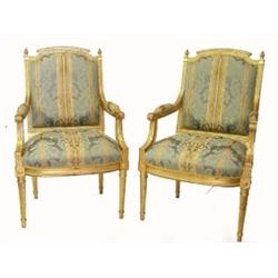 PAIR OF CHARLES X STYLE CARVED AND GILTWOOD ARM CHAIRS, Each curved top rail with crown finials...