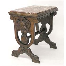 CARVED WALNUT SIDE TABLE, The rectangular marble top with bow ends above the trestle supports c...