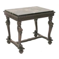 CARVED WALNUT SIDE TABLE, The rectangular marble top above the scroll carved frieze supported b...