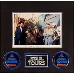 "Star Tours" Photo Signed by George Lucas.