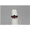 Image 1 : Ruby and Sapphire Ring - 5x7mm Oval Faceted Ruby Approx .75 ct, 2 Blue Sapphires 4.5x6.5mm Approx 1.