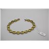 Image 1 : 14K Gold Link Bracelet w/16 Oval Peridots, 6x8mm Each, Approx. 20 ct Total Wt, 12.2 g