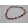 Image 2 : 12 ct Amethysts Link Bracelet 6 7/8" Length - 16 Amethysts 6x9mm Each, 12 ct, 14K Gold, 7.1 g