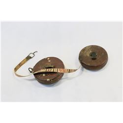TWO ANTIQUE MEASURING TAPES