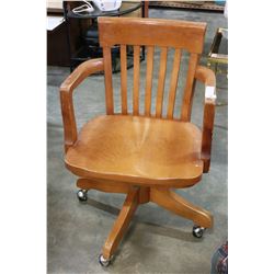 VINTAGE ROLLING OAK OFFICE ARMCHAIR