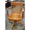 Image 1 : VINTAGE ROLLING OAK OFFICE ARMCHAIR