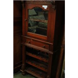 CARVED GLASSDOOR CABINET WITH GALLERY AND LOWER WINE STORAGE