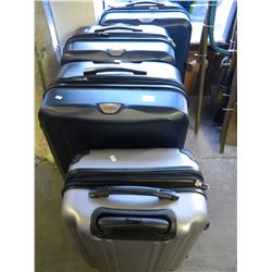 4 TRAVEL SUIT CASES