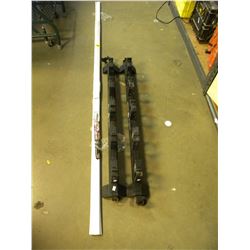 SET OF ROOF SKI RACKS & PACKAGE OF DOOR DRAFT SEALER
