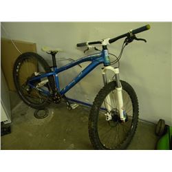 BLUE AND WHITE GT MOUNTAIN BIKE