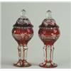 Image 1 : PAIR OF BOHEMIAN OVERLAY RUBY GLASS POKALS WITH COVERS