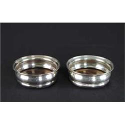 PAIR OF SILVER PLATED AND WOOD WINE COASTERS