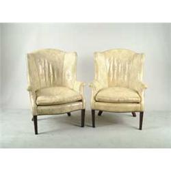 PAIR OF LEATHER EMBOSSED UPHOLSTERED WING CHAIRS
